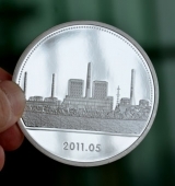 中國(guó)國(guó)電諫壁發(fā)電廠機(jī)組投產(chǎn)純銀紀(jì)念章制作